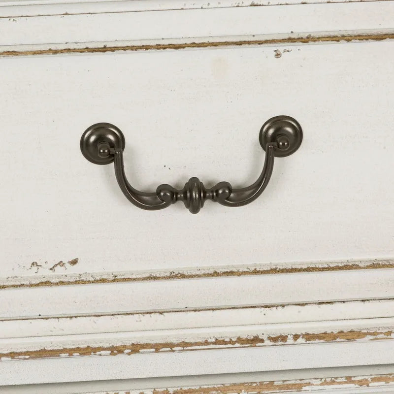 La commode à 7 tiroirs marron vieilli et blanc antique