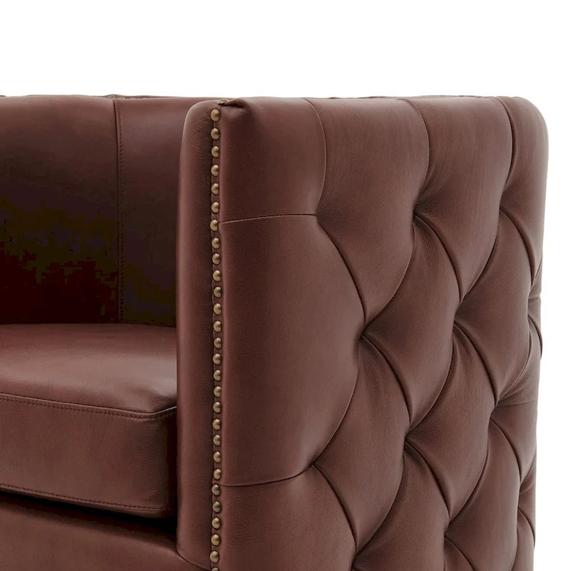 Fauteuil capitonné pivotant en cuir pleine fleur