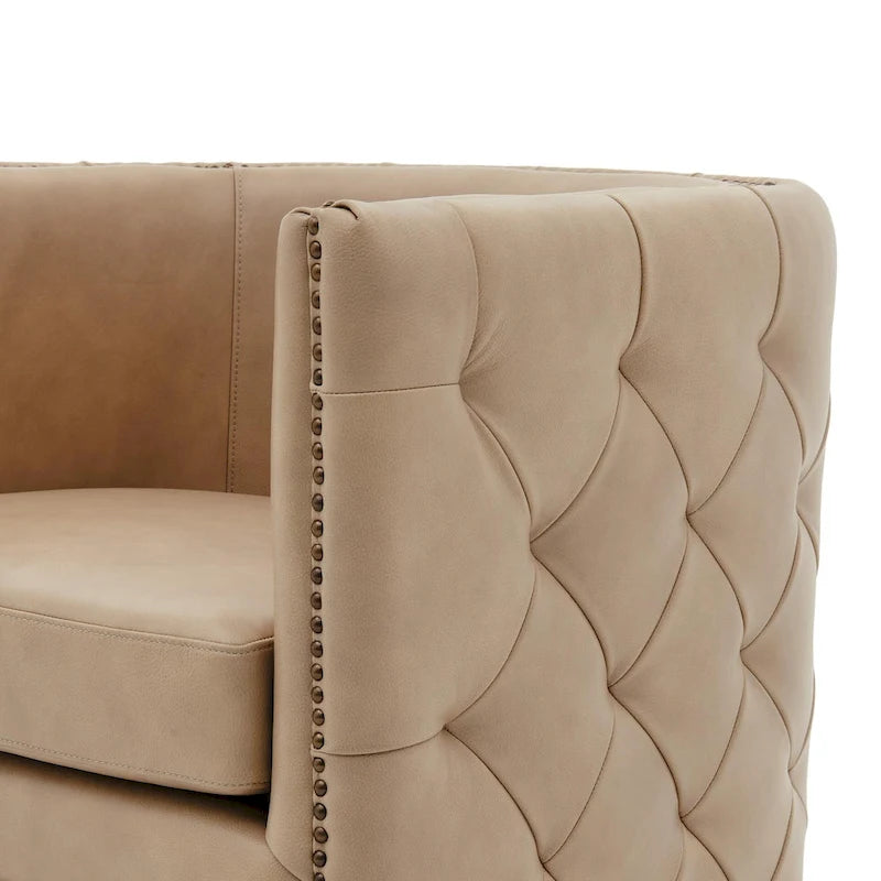 Fauteuil capitonné pivotant en cuir pleine fleur