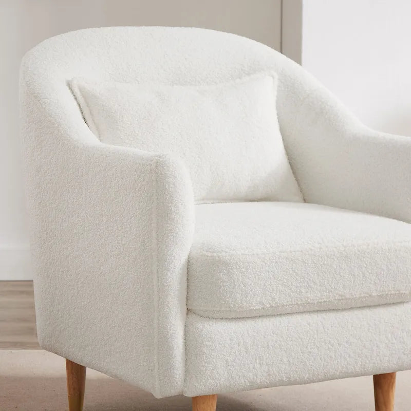 Fauteuil en velours avec pieds en bois massif