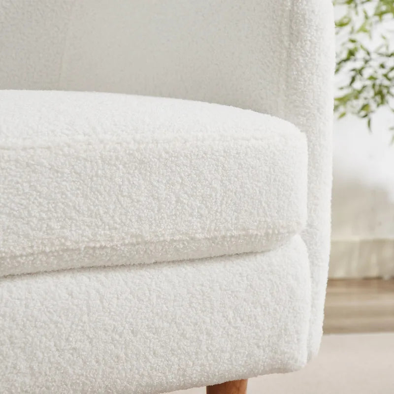 Fauteuil en velours avec pieds en bois massif