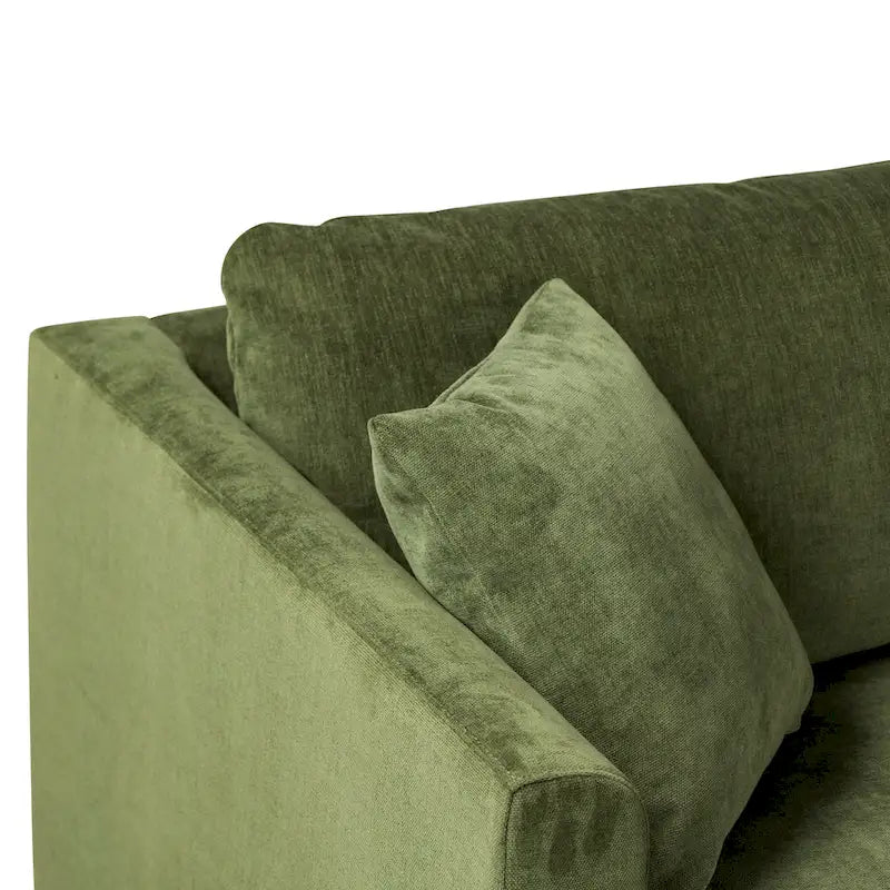 Canapé d'angle avec très longue méridienne en velours vert vieilli