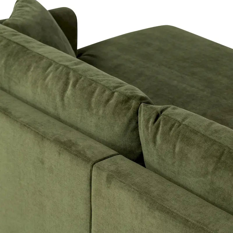 Canapé d'angle avec très longue méridienne en velours vert vieilli
