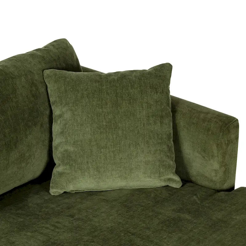 Canapé d'angle avec très longue méridienne en velours vert vieilli